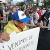 Las personas que asistieron a la movilización llevaron pancartas con mensajes de apoyo al Gobierno de Gustavo Petro. 